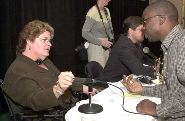 Mary Lou Breslin at microphone