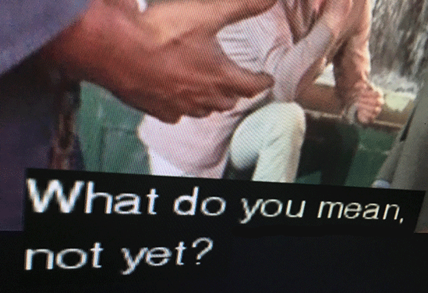 A man's hand with caption that reads: "What do you mean not yet?"