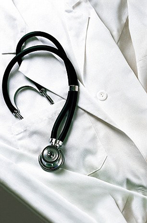 White doctor's coat with stethoscope in pocket