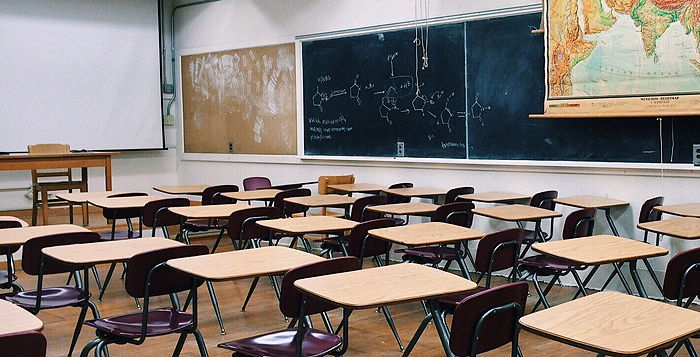 A classroom full of empty desks