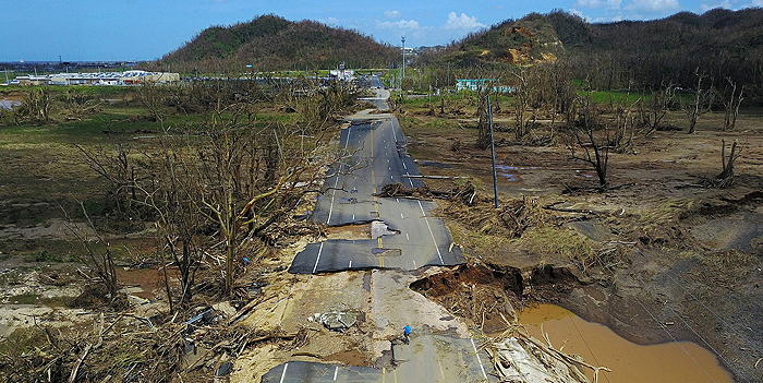 Muddy water and damaged road in Puerto Rico