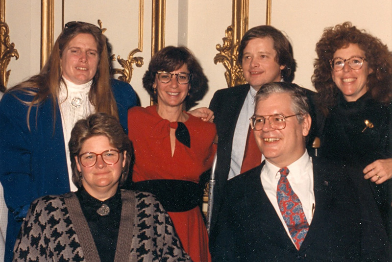 Group photo all smiling for the camera.