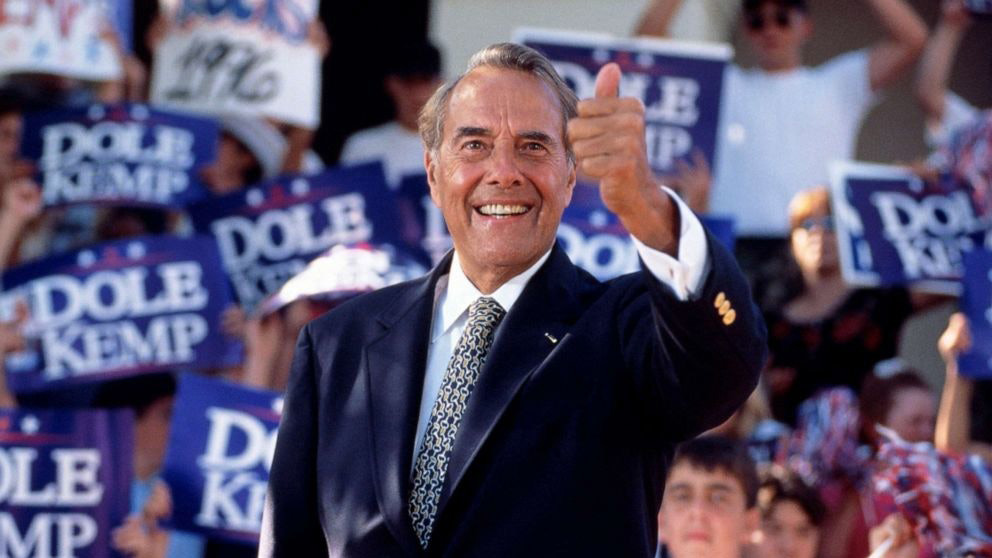 Bob Dole giving a thumbs up on the campaign