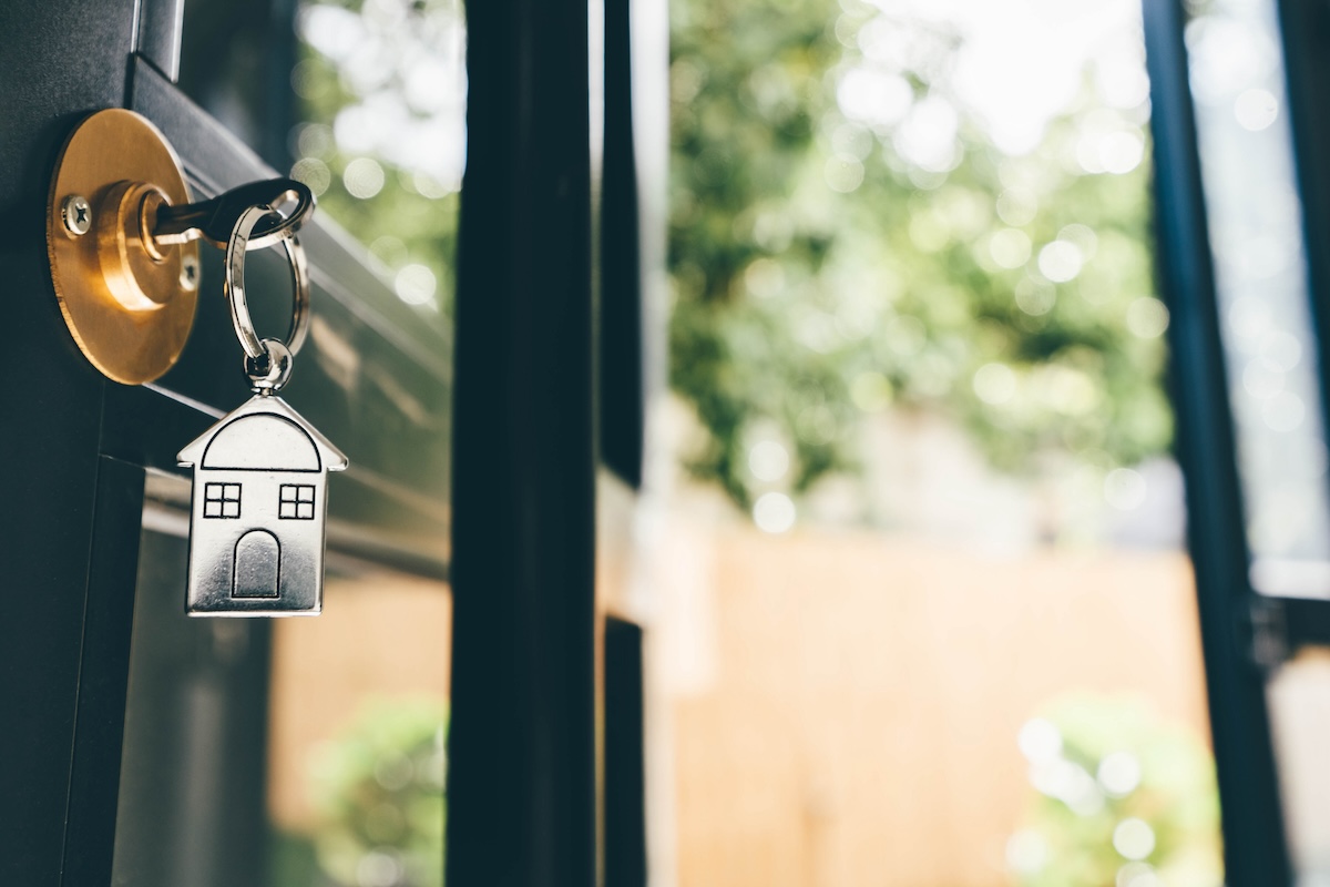 House keys in the door to a home