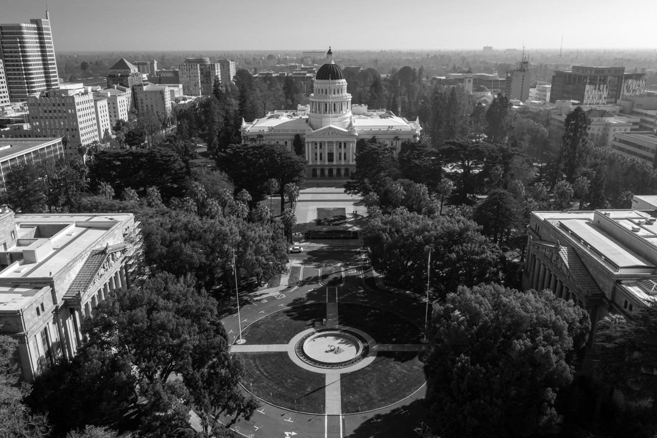 Black and white aerial photograph of the capitol building in Sacramento, California