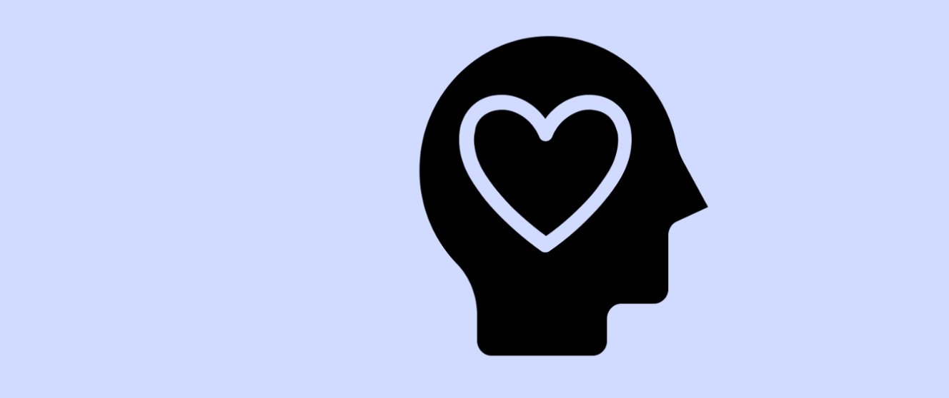 Icon of the profile of a human's head with a heart in the center