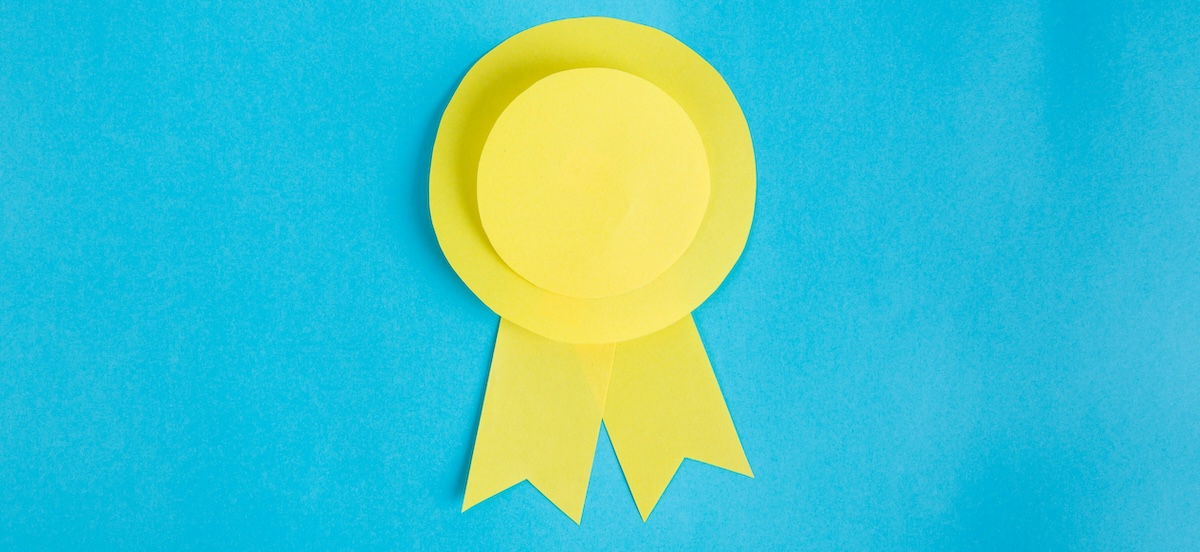 A yellow ribbon on a blue background